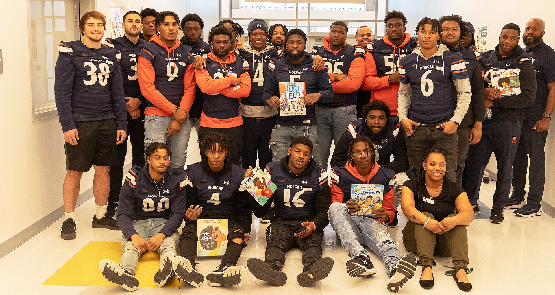 State football players encourage reading at Baltimore elementary